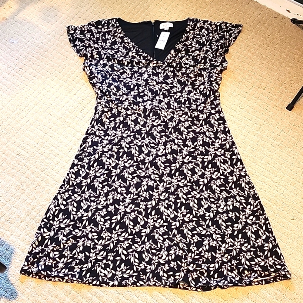 Loft outlet dress with wrap top with slight flare skirt.
